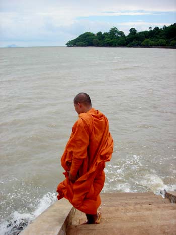 a monk at the kep ocean in cambodia